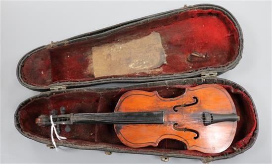 A cased model of a violin Violin 24cm long